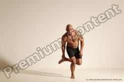 Underwear Gymnastic poses Man Black Muscular Bald Dancing Dynamic poses Academic